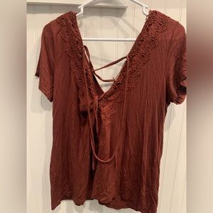 Womens Day Trip open back short sleeve shirt.